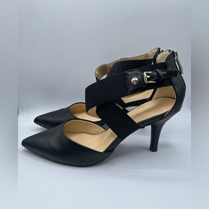 Liz Claiborne black pointed pump with cross cross straps.